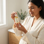 Woman using Thévaa Turmeric Face Serum